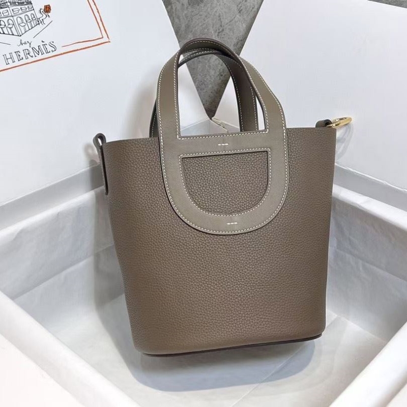 H**mes shopping bags